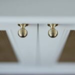 White cabinets with gold knob handles
