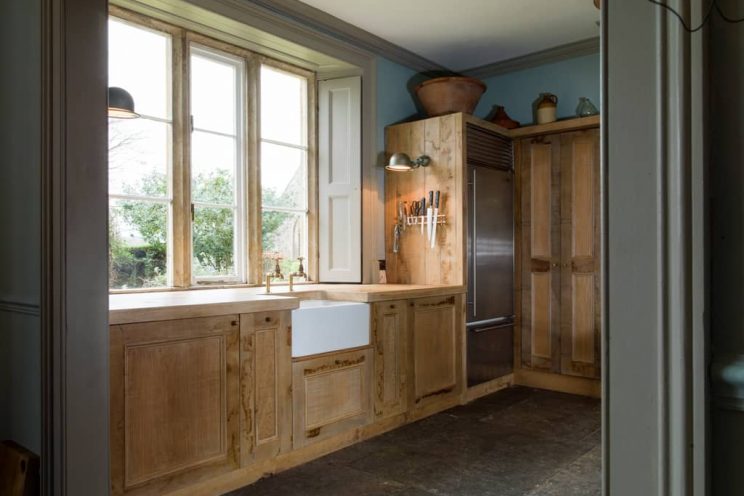 Rustic sustainable kitchen cabinets designed by Mia Marquez