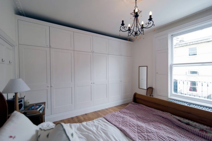 White fitted wardrobe in master bedroom