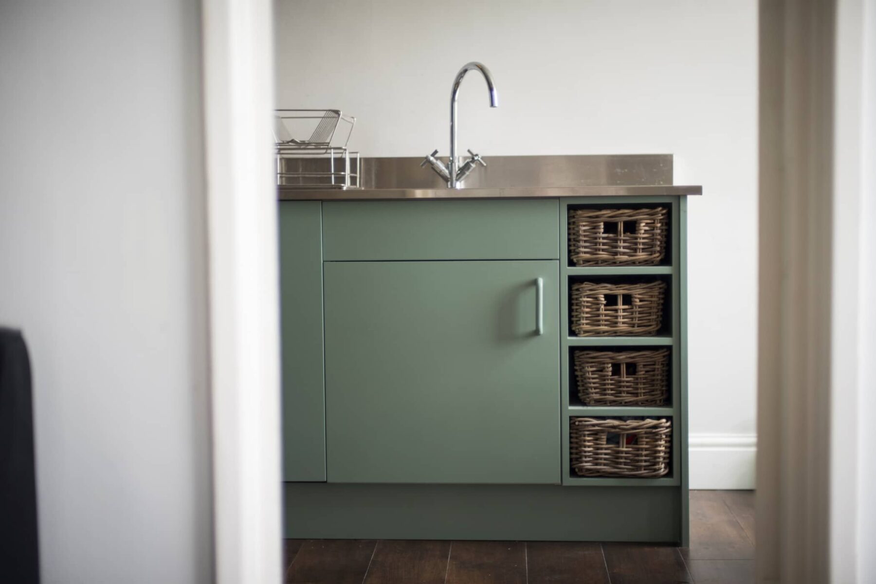 Storage detail from a bespoke contemporary kitchen by Bath Bespoke