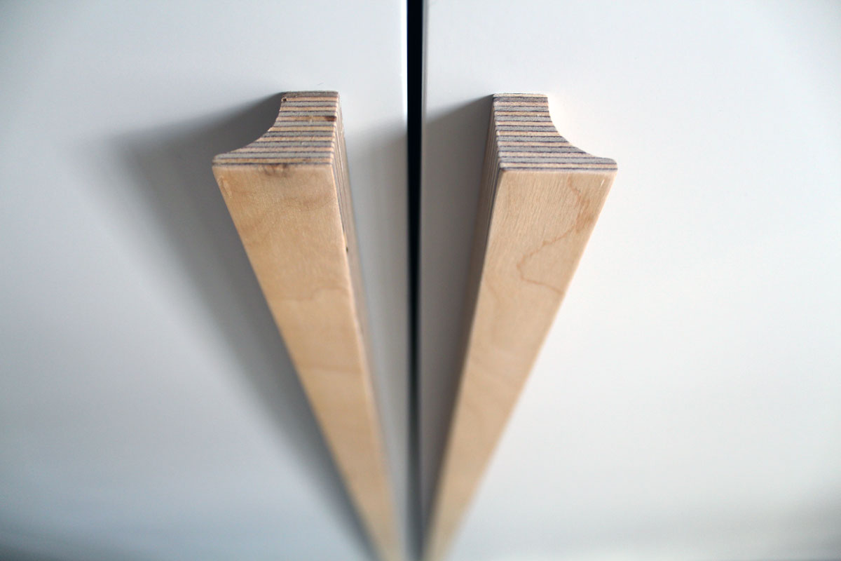 Long bespoke wooden wardrobe handles