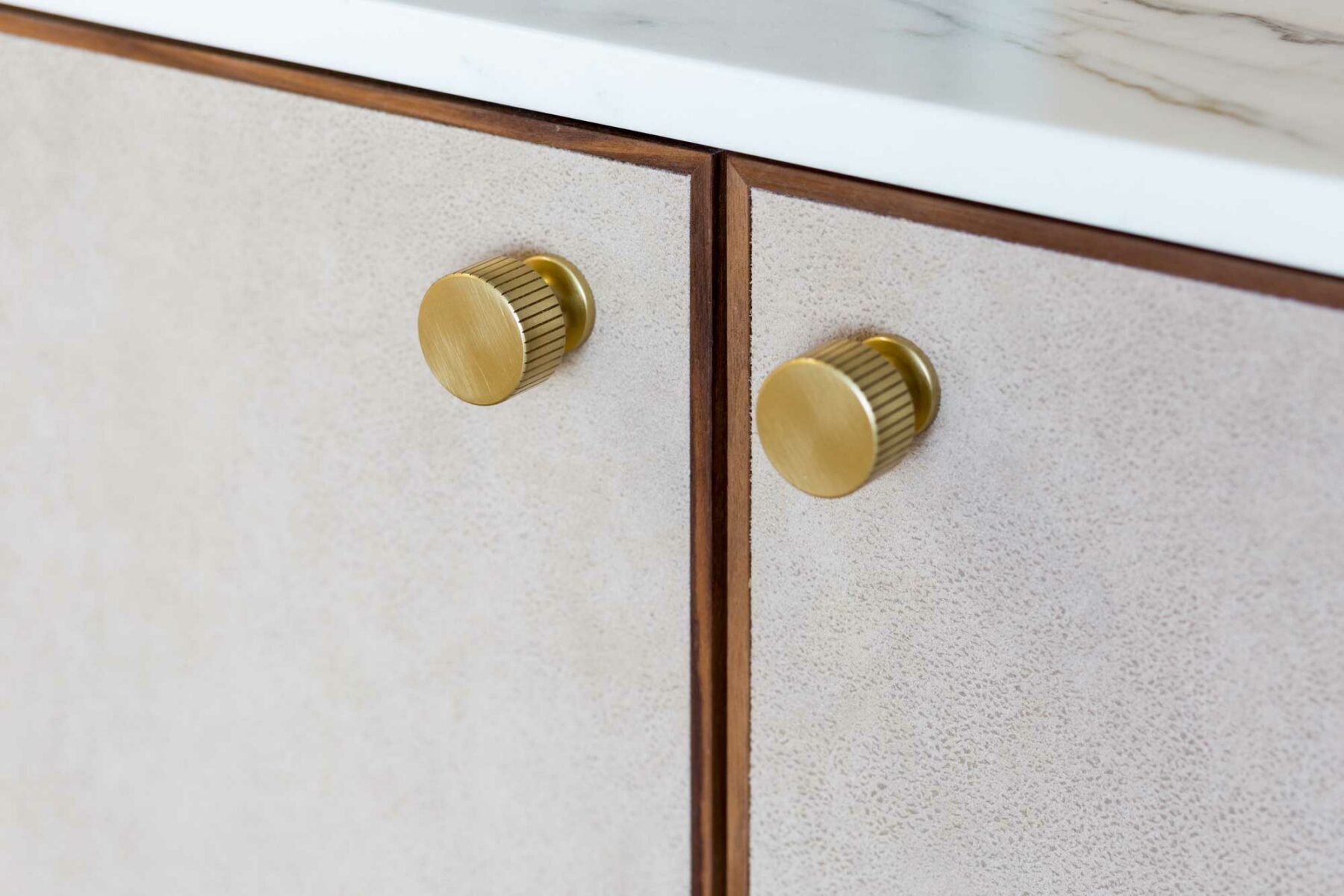 Alcove cabinets with brass Armac Martin handles