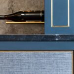 Wine wall with marble top and brass inlay designed by Mia Marquez