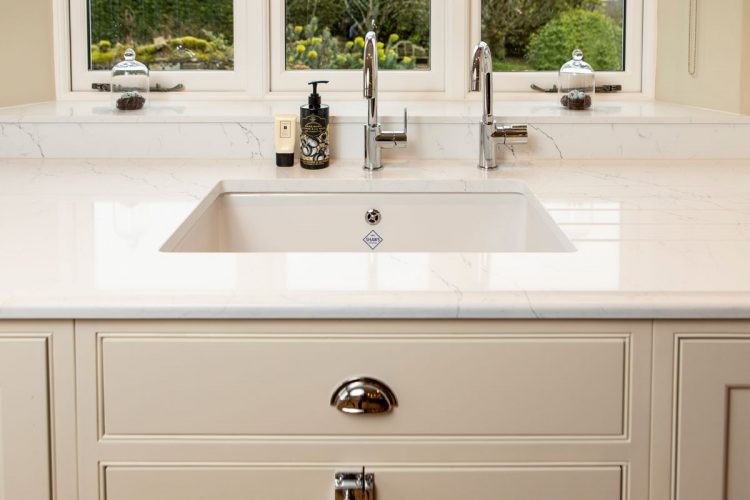 The sink area with an under mounted Shaw’s ceramic sink