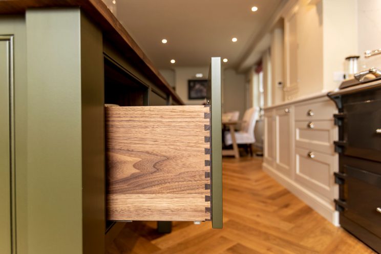 Walnut drawers in classic country kitchen