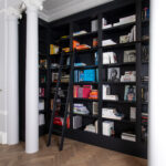 Bespoke, built-in library bookcase with ladder