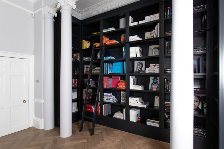 Bespoke, built-in library bookcase with ladder