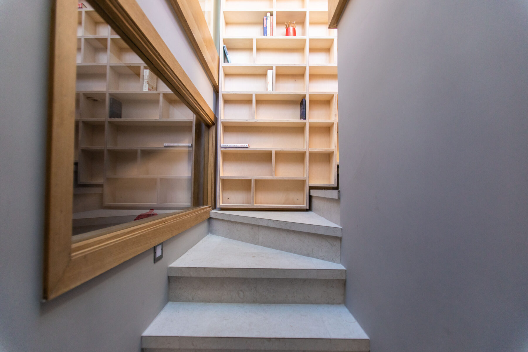 Library bookcase on stairway