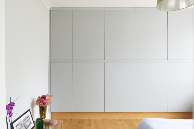 Apartment renovation - fitted wardrobes with sprung clothes rails