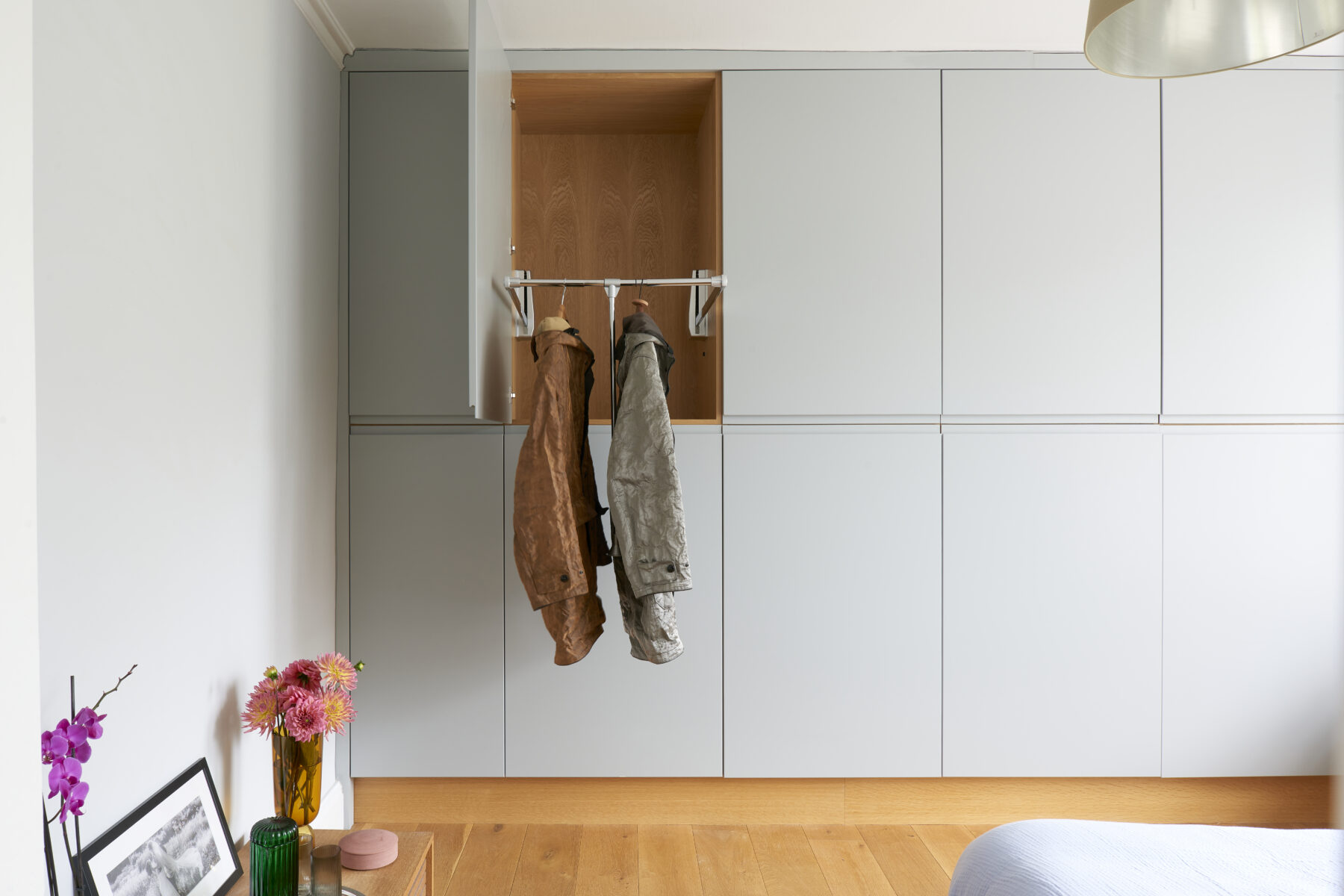 Apartment renovation - fitted wardrobes with sprung clothes rails