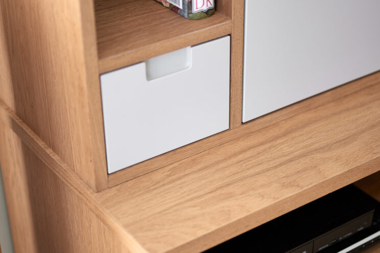 AV cabinet with bespoke storage drawers