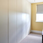 Slab door wardrobe storage (designed, manufactured & installed)